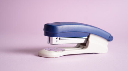 Stapler, staple, paper, cardboard, office equipment. Office device for paper. Tools for documents fastening 