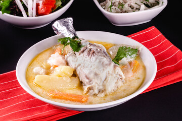 Roast chicken drumsticks and vegetables