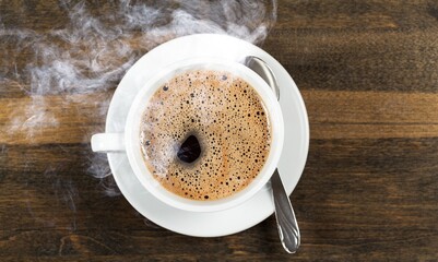 Aroma coffee cup on wooden desk