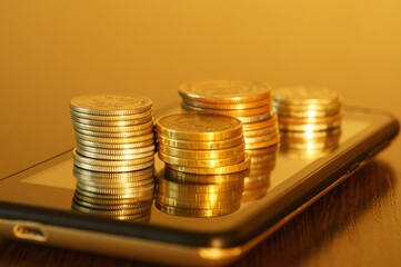A stack of coins on your mobile phone.