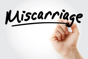 Miscarriage text with marker, concept background