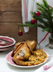 Baked duck with cabbage in a festive decoration. Rustic style.