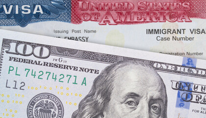 Fototapeta premium VISA United States of America and Money 100 Dollar bill. Work and Travel VISA. Immigration to the USA. Immigration visa. Embassy US or USA. Vacation in the USA. Visa in passport. 