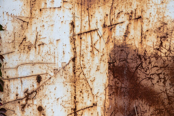 Interesting painted old metal surface with traces of rust, scratches and time damage texture