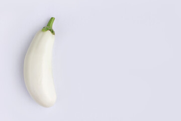Unusual eggplant. total white aubergine minimalism trend. vegetable background place for text copy space