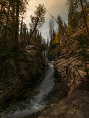 Waterfall in the forest in the fall 