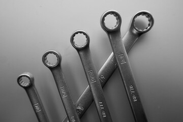 Blzck and white photography of a silver tightening wrench set 
