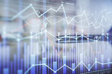 Double exposure of forex chart over coffee cup background in office. Concept of financial analysis and success.