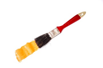 paintbrush isolated on white background. Orange paint color. Painting activity. 