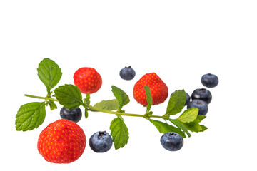 Fresh summer strawberries and blueberries with a mint branch isolated on a white background, top view. Flat layout. Space for text