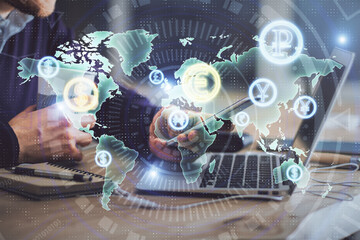 Double exposure of man's hands holding and using a phone and financial graph drawing. Analysis concept.