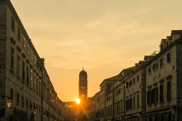 Historical stone houses of the famous Stradun street (Placa) in Dubrovnik, at sunset