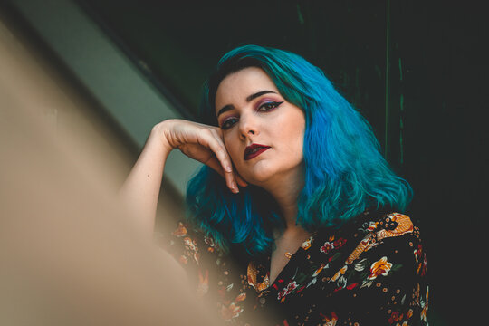 Portrait Of A Blue Haired Woman With Tattoos. Tattoo.