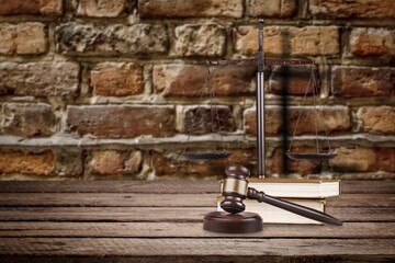 Obraz na płótnie Canvas Justice Scales and books and wooden gavel on table. Justice concept