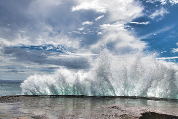 Explosive sea crashing against the shore.