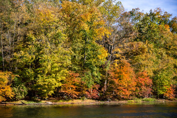 The beautiful colors of the autumn along a lake in upstate New York.