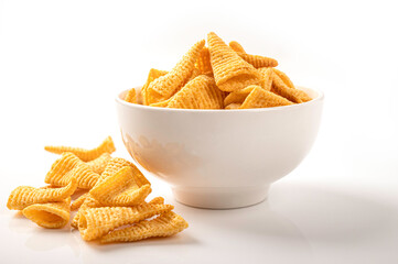Corn snack in white bowl isolated on white background.