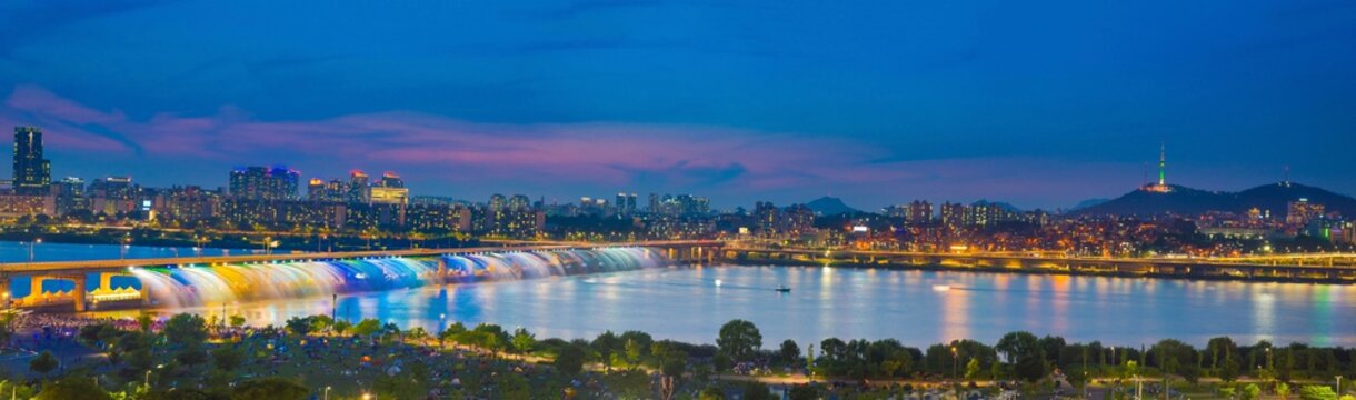 panorama image Seoulcity South Korea. Han River and Rainbow founta in Seoul, South Korea.