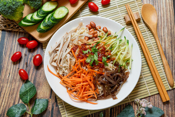 Yunnan-Style Cold Noodles, (cold noodles and vegetables in a sweet, sour, and savory sauce.)