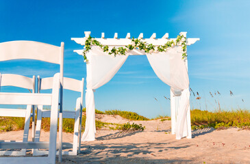 Beautiful Ocean Side Wedding Arch Arbor On Sandy Beach With Chairs