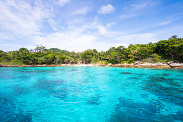 Nature and travel. Beach sea and blue sky with clouds background.