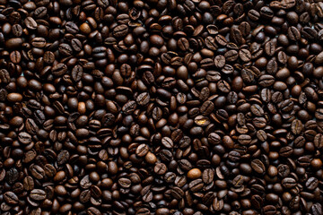 Top view of fresh roasted Coffee beans. Isolated on a white background.