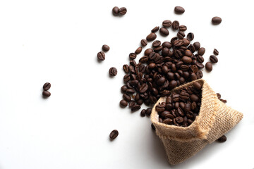 Top view of fresh roasted Coffee beans. Isolated on a white background.
