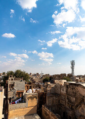 ariel view of a old bikaner city ariel view of a old bikaner city and dramatic clouds with blue sky