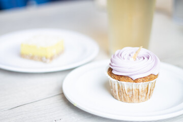 Purple vegan cupcake with frosting
