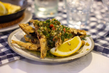Fried Greek fish with lemon