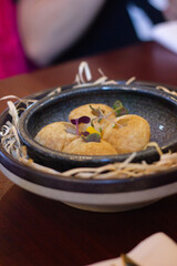 Pani puri in a ceramic bowl