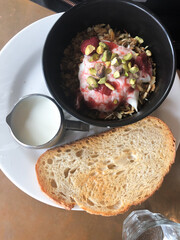 Yoghurt with granola and side of toast