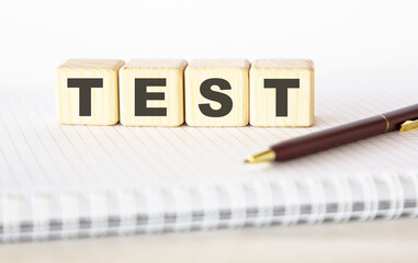 BLOCK AND HANDLE ON A LIGHT BACKGROUND. THE WORD IS WRITTEN ON CUBES. Coma. THE CONCEPT OF MEDICAL