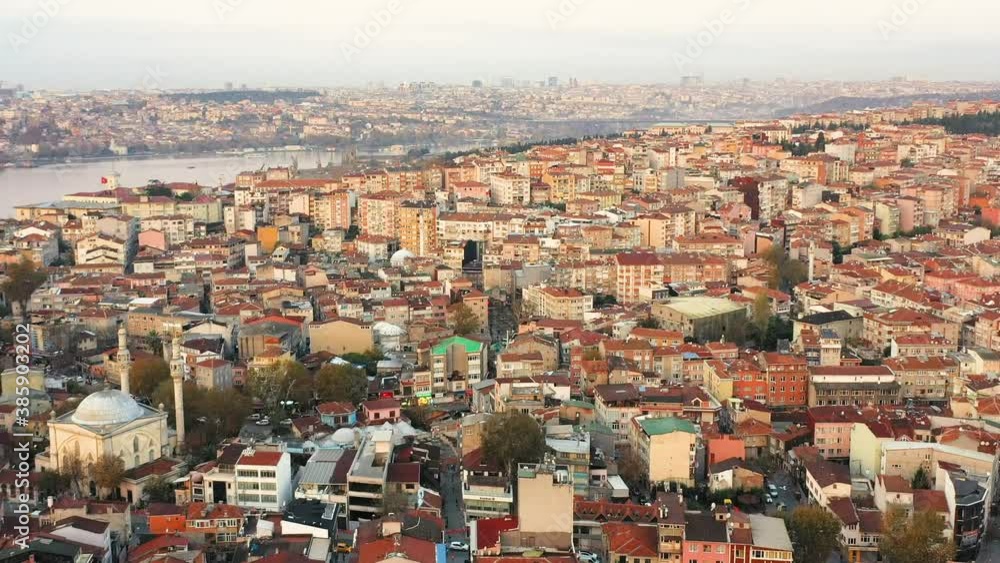 Wall mural Aerial view of houses with orange roofs in Istanbul, Turkey / 4K