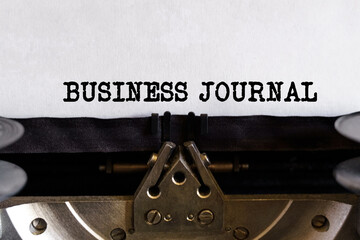 Vintage typewriter with typed text - BUSINESS JOURNAL