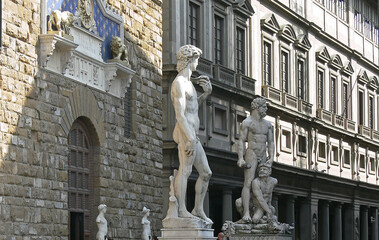 The entrance of the Uffizi Gallery in Florence, Italy with Michelangelo's famous sculpture, David