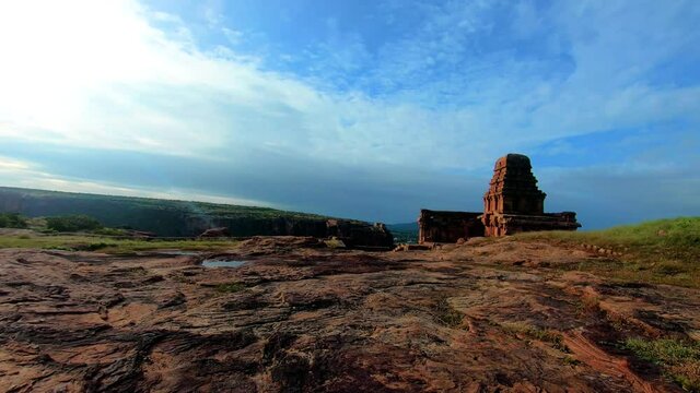 cloud motion above ancient stone art temple isolated with amazing sky