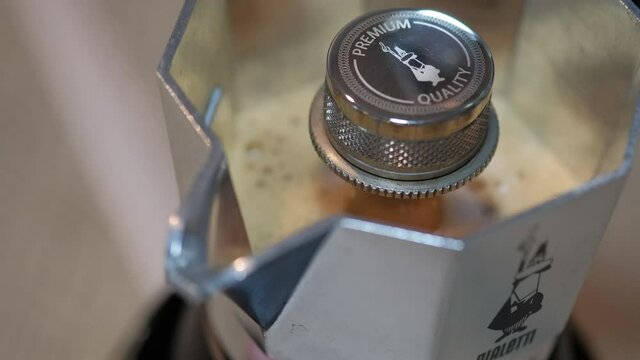 Bangkok, Thailand - Oct 9, 2020: 
 Black coffee from silver moka pot, bialetti brikka brand