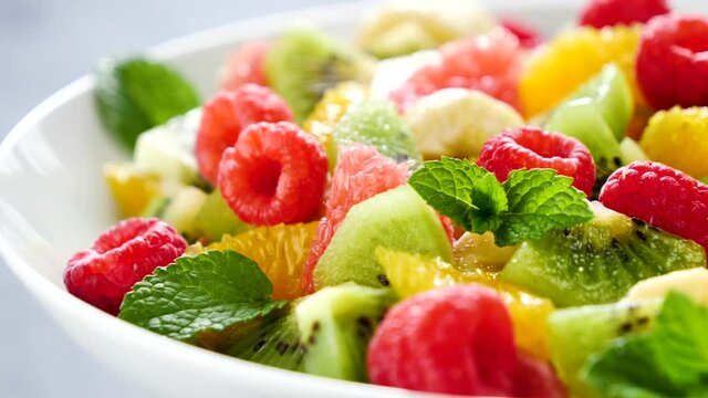 fresh healthy fruit salad in bowl