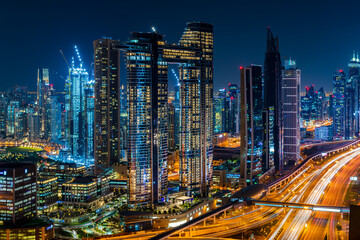 Arial view of Dubai cityscape at night with beautiful lights