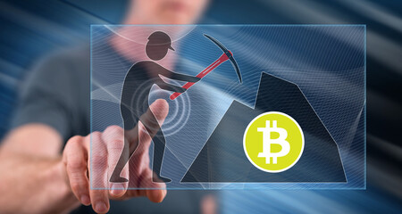 Man touching a bitcoin mining concept