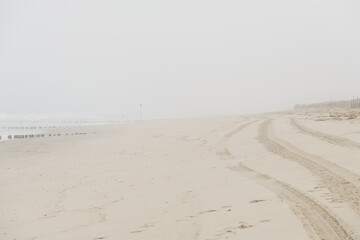 Fototapeta na wymiar Foggy beach in the early morning