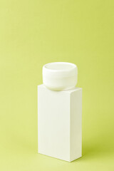 Blank white plastic container for cream, lotion, nourishing or moisturizing mask. Eco-friendly, organic cosmetology.