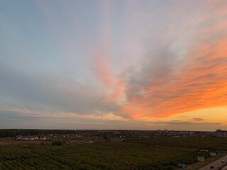 Amazing orange sunset  from the house with landscape on background 