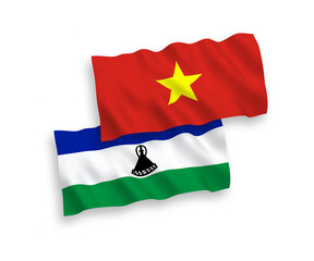 Fototapeta premium Flags of Lesotho and Vietnam on a white background