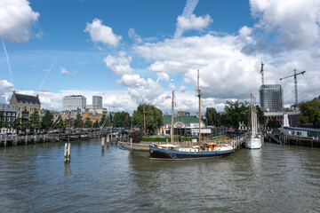 Fototapeta na wymiar Rotterdam port (Veerhaven) and city skyline in South Holland, the Netherlands.