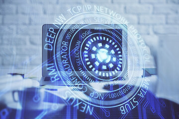 Multi exposure of desktop computer and technology theme hologram. Concept of software development.