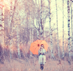 young woman umbrella autumn / autumn trendy look, model with umbrella, rainy cold weather