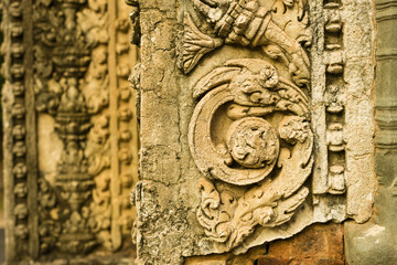 detail of a carving on the Preah Ko temple in Roluos Group, Angkor, Siem Reap, Cambodia