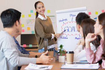 Asian business man and women meeting and talk about job in office.